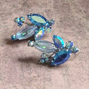 Signed vintage Aurora Borealis and blue Swarovski Keyes earrings. Rodium plated